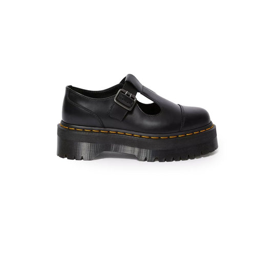 Dr. Martens – Flache Schuhe aus schwarzem Leder